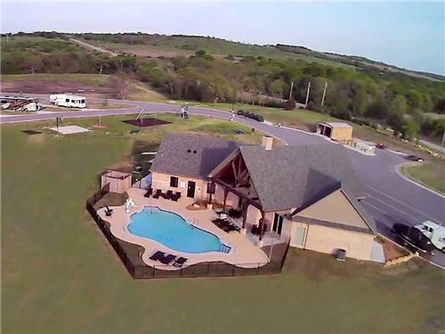 Aerial view of campground pool at BY THE LAKE RV PARK