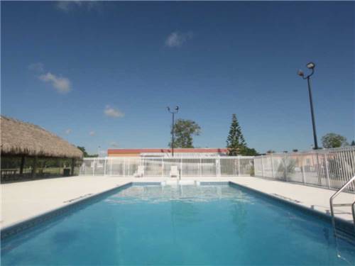 The swimming pool area at BRIGHTON RV RESORT