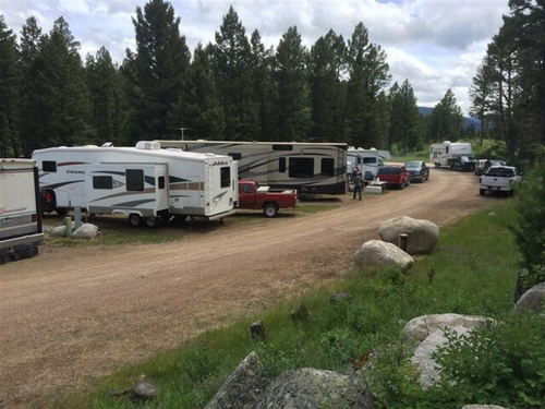 A row of campers at Boulder Creek Lodge and RV Park
