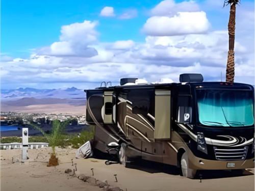 A large RV parked in a site