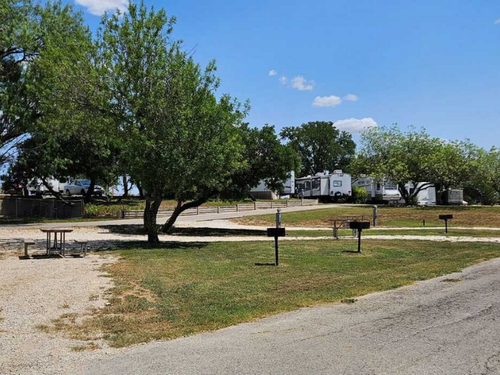 Trees by site at Tejas Valley RV Park