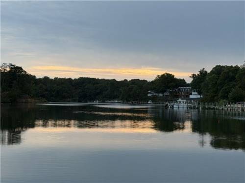 The sun sets over the water