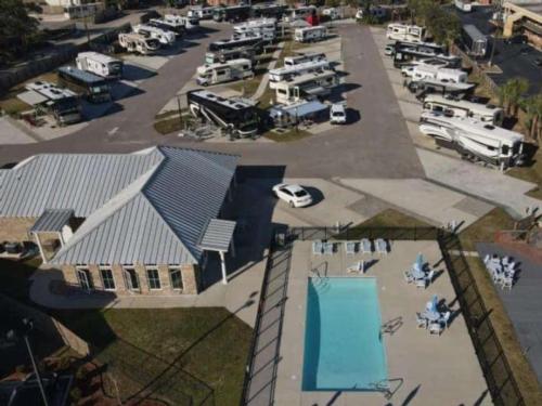 Sky view of park and pool at Gulf Beach RV Resort