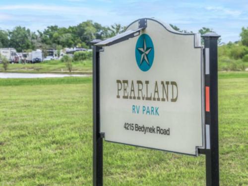 Entrance sign at Pearland RV Park