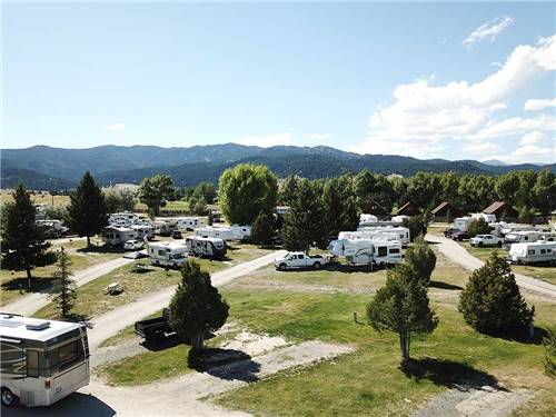 Drone view of park with distant mountains at FAIRMONT RV RESORT