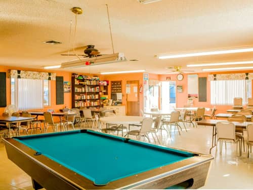 A billiard table in the rec hall