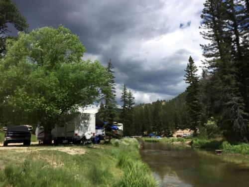 RV sites in the forest by a river