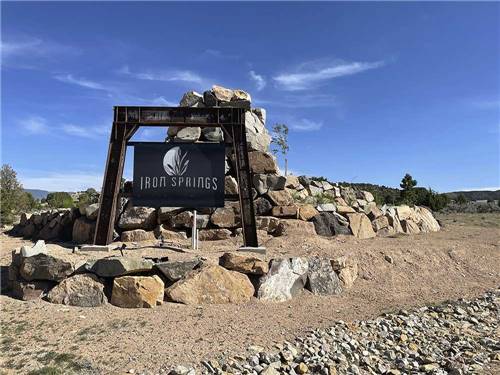 The front entrance sign at IRON SPRINGS ADVENTURE RESORT