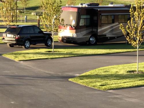 RV and black SUV in site