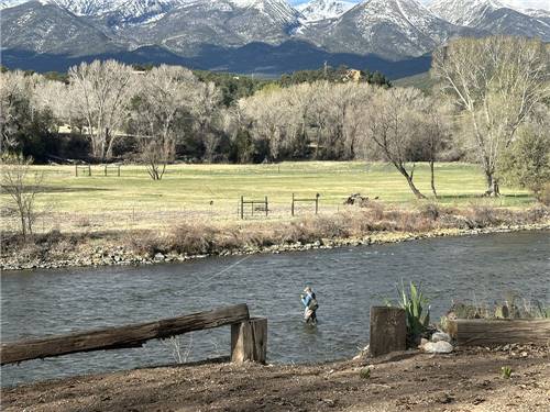 A man fly fishing in the river
