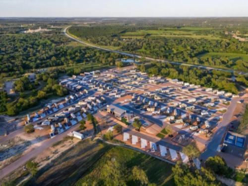 Aerial shot of sites and surrounding area at Stone Oak Ranch RV Resort