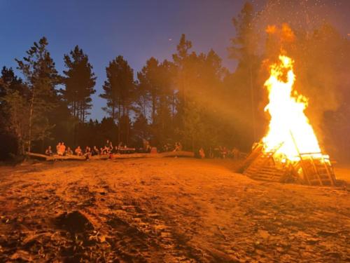 People watching a bonfire