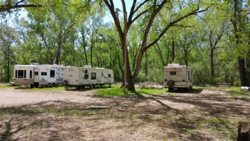 Variety of RVs parked at sites