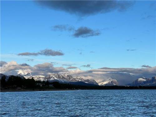 Snow-capped mountains beyond the lake at Duck Lake Campground