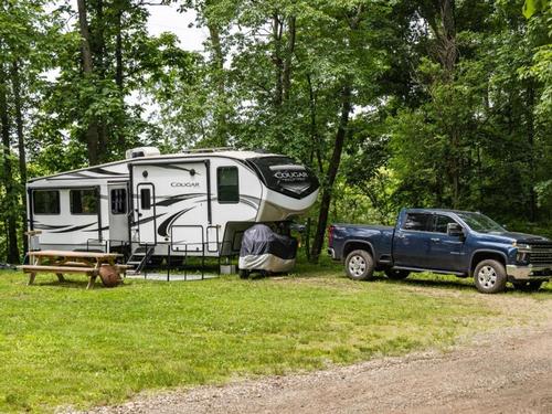 Parked trailer next to pick up truck at Lake Wapusun RV Resort