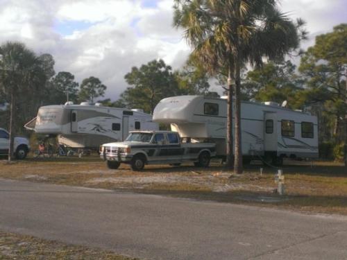 Towable trailers at sites at Calusa Cove RV Park