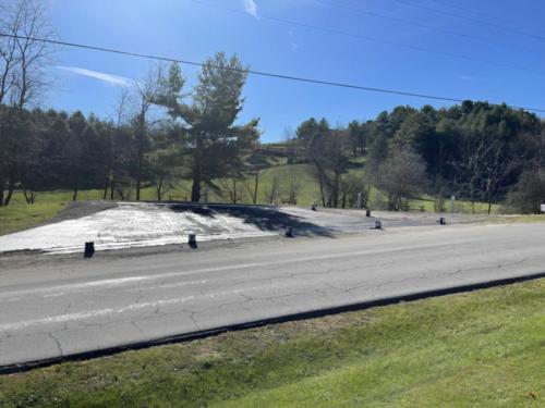 Paved open RV site at Cold Springs at Little Pond Mountain Campground