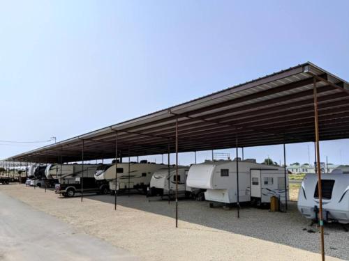 Covered parking are for trailers at site Stateline Cabins & RVs