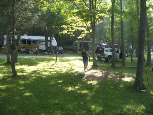 Parked RV at site Country Charm Campground