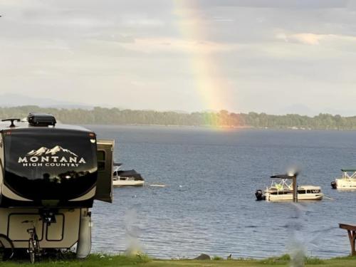 Parked trailer with lake view at site Sunset Rock RV Park & Lake Shore