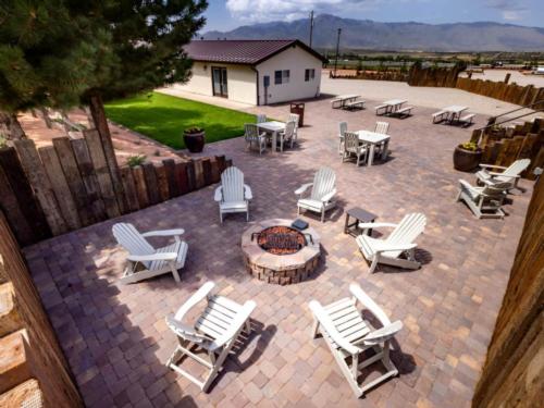 Parked RV at site The Orchards at Kolob RV Resort