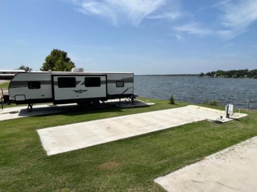 Open RV space at site Oasis Lake Buchanan