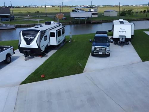 Parked RV's at site Waterside RV Resort