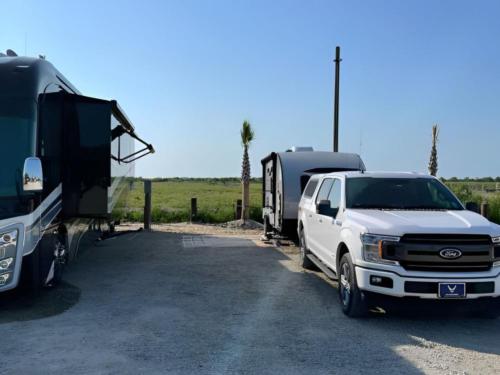 Parked RV at I'm on Vacation - RV + Camper Retreat