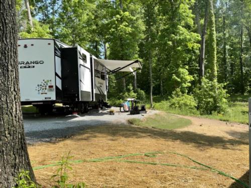 Parked RV at site Red Coach Resort