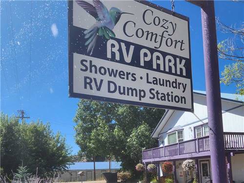 The front entrance sign at COZY COMFORT RV PARK