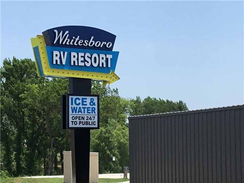 The tall front entrance sign at WHITESBORO RV RESORT