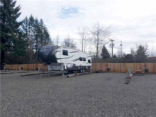 A fifth wheel parked at FAR WEST RV PARK