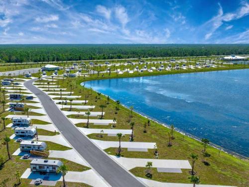 An aerial view of the RV sites and large lake at ENCORE TRANQUILITY LAKES