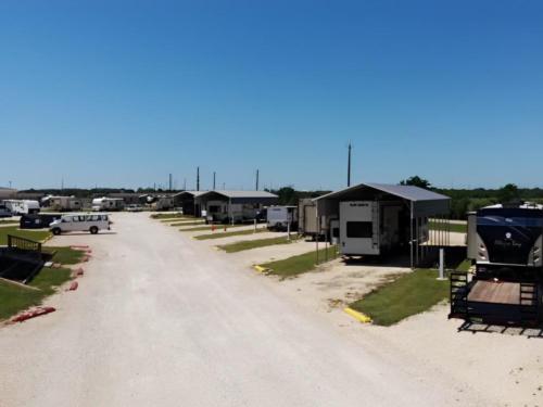 Covered RV parking at site Freeport Friendly RV Park