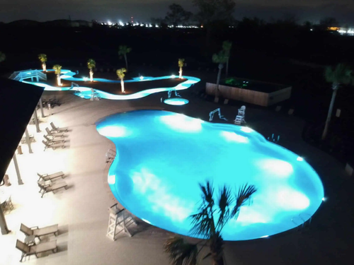 Pool at night Tiger's Trail RV Resort