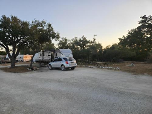 Parked trailer next to vehicle at Homestead Hill