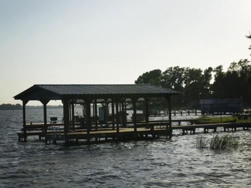 Marina building and docks on the water at Lake Murvaul Park & Marina