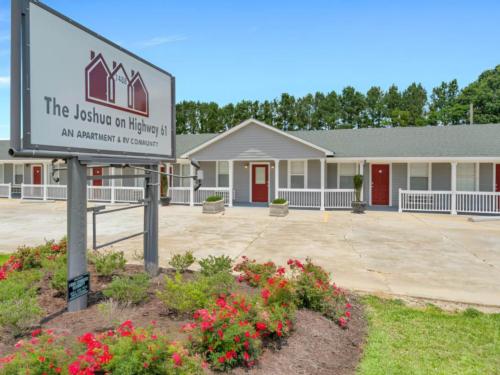 Welcome sign at The Joshua on HWY 61