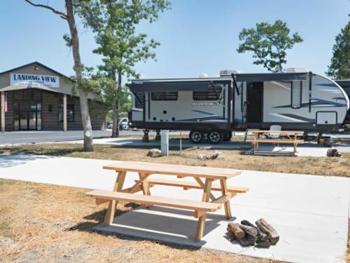 Panic table with parked trailer at Landing View Campground