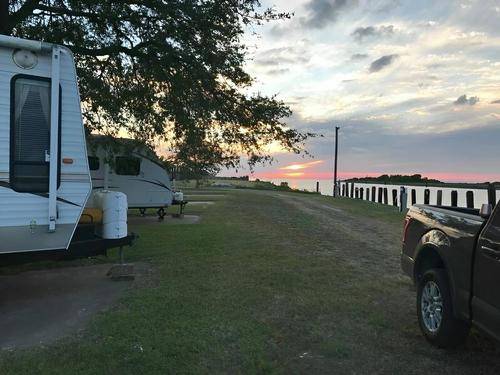 RV sites by the water at RV Park Spoonbill