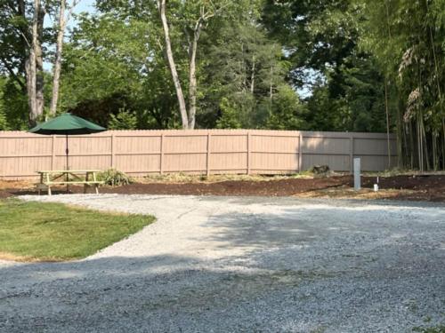 Open RV space with panic area at Oak Fern RV Park