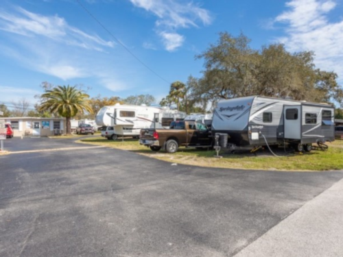 RVs lined up at Tropic Breeze RV Park