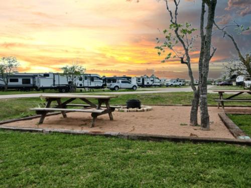 Picnic table and fire pit at Bay RV Park