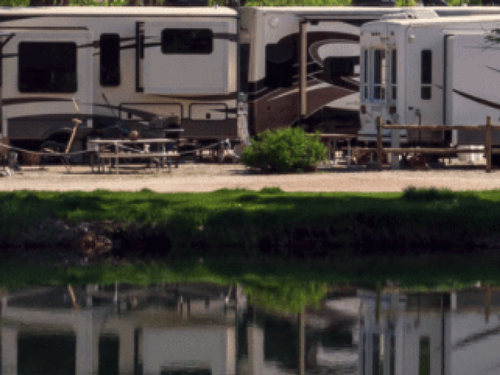 RV at by the water Snug Harbor RV Park & Marina