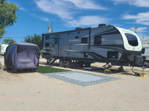 Grass are by site Willow Beach RV Park & Marina