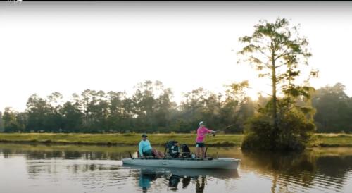 Family fishing in boat at Leisure Lakes RV Resort