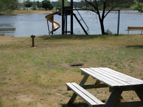 Lake view with panic table at Wolf Lake Resort and Campground