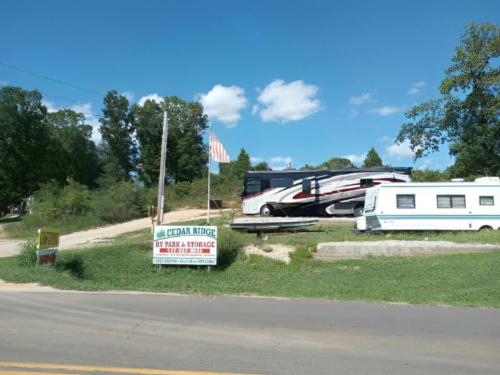 Parked RV's at site Cedar Ridge RV Park & Storage