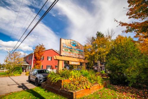 Welcome sign at site Pemi Cabins