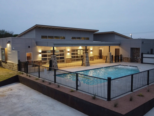 The pool at dusk at Ennis Luxury RV Resort